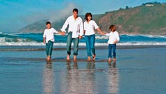 family on beachfront